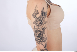 Rada arm nude tattoo 0002.jpg